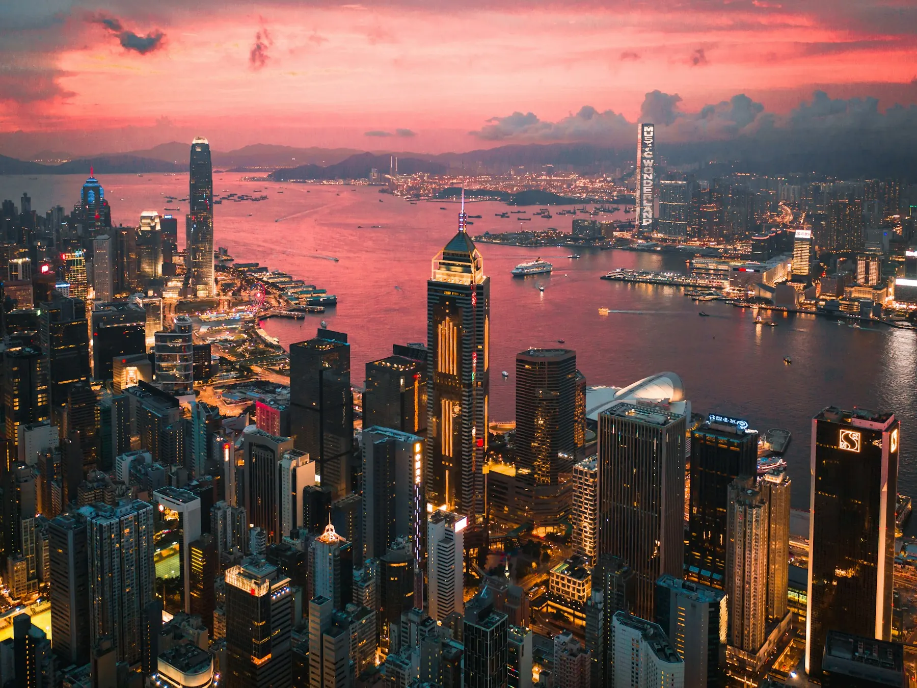 Victoria Harbour skyline in Hong Kong at sunset