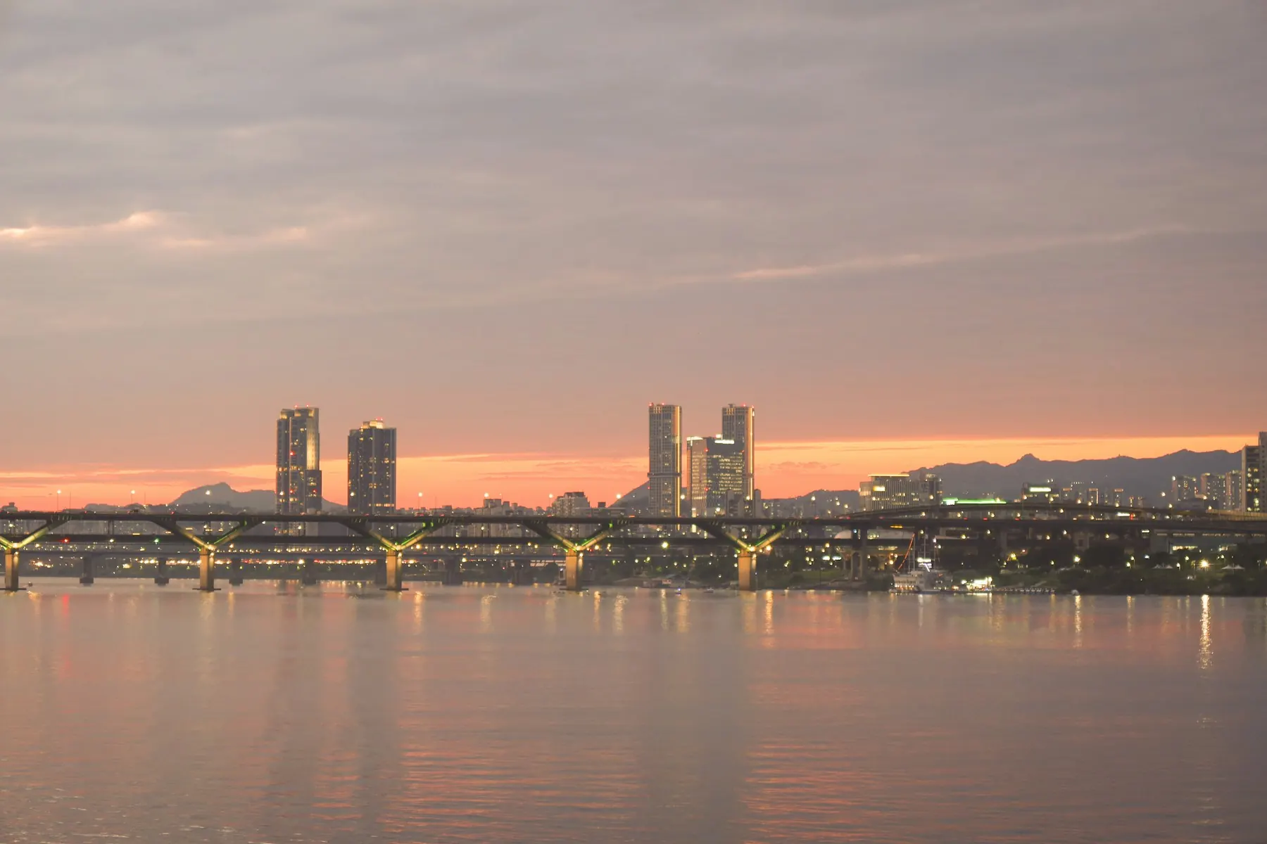 Seoul skyline along the Han River at sunset