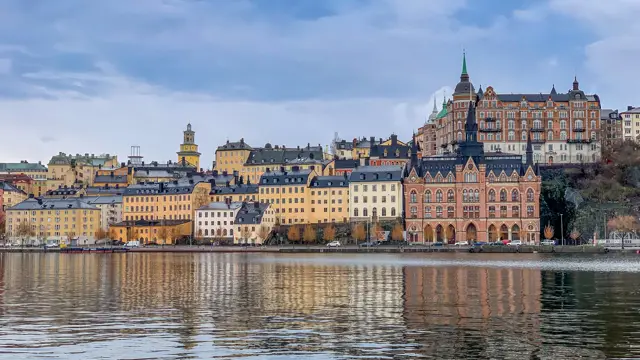 Stockholm skyline over the water, with Gamla stan and the City Hall tower